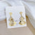 1 Pair Casual Simple Style Heart Shape Flower Butterfly Plating Inlay Copper Pearl Zircon Drop Earrings