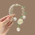 Ancient Style Orchid Tassel Hairpin Ball Head Fixed Clip Female High-grade Hair Buckle Temperament Half Tie Updo Hair Accessories