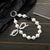 Casual Simple Style Irregular Bow Knot Beaded Inlay Rhinestones Bag Pendant Mobile Phone Chain Keychain