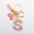 Casual Simple Style Letter Flower Butterfly Plastic Resin Sequins Epoxy Bag Pendant Keychain