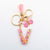 Casual Simple Style Letter Flower Butterfly Plastic Resin Sequins Epoxy Bag Pendant Keychain