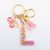 Casual Simple Style Letter Flower Butterfly Plastic Resin Sequins Epoxy Bag Pendant Keychain