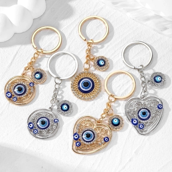 Casual Vintage Style Simple Style Devil's Eye Heart Shape Alloy Inlay Rhinestones Bag Pendant Keychain