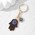 Casual Vintage Style Simple Style Devil's Eye Palm Alloy Inlay Rhinestones Bag Pendant Keychain