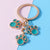 Cute Dog's Paw Zinc Alloy Enamel Bag Pendant Keychain