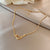 Elegant Simple Style Geometric Titanium Steel Plating Inlay Artificial Pearls Shell Zircon Necklace