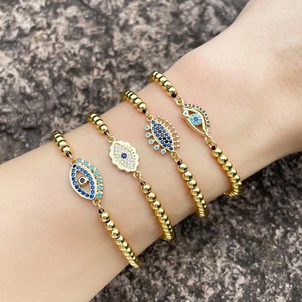 European And American Simple Micro Inlaid Zircon Devil's Eye Bracelet Woven Gold Copper Bead Adjustable Pull Bracelet Brd69