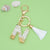 Fashion Letter Tassel Alloy Epoxy Bag Pendant Keychain 1 Piece