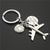 Fashion Round Letter Airplane Alloy Keychain