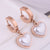 Fashion Simple Peach Heart Pearl Titanium Steel Earrings Wholesale