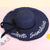 Fashion Wide-brimmed Outdoor Streamer Letter Printing Straw Sunscreen Hat