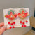 Kid'S Ethnic Style Flower Butterfly Arylic Resin Sequins Plating Artificial Pearls Hair Clip