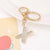 Korean Style Letter Zinc Alloy Inlay Artificial Gemstones Unisex Bag Pendant Keychain