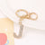 Korean Style Letter Zinc Alloy Inlay Artificial Gemstones Unisex Bag Pendant Keychain