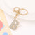 Korean Style Letter Zinc Alloy Inlay Artificial Gemstones Unisex Bag Pendant Keychain