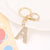 Korean Style Letter Zinc Alloy Inlay Artificial Gemstones Unisex Bag Pendant Keychain