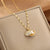 Lady Animal Flower Artificial Pearl Titanium Steel Copper Plating Inlay Zircon Pendant Necklace