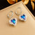 Fashion Heart Titanium Steel Diamond Inlay Earrings