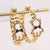 Niche Women Geometric Metal Animal Hollow Bowknot Bowknot Copper Diamond Inlay Earrings