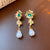 Mid-century Modern Droplet Droplet Artificial Pearl Inlay Earrings