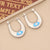 Expressive Eye Geometric Stainless Steel Oil Dripping Earrings