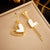 Minimalist Heart Chain Tassel Titanium Steel Electroplating Earrings