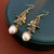 Luxurious Droplet Droplet Geometric Artificial Pearl Diamond Inlay Earrings