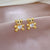 Korean Cosmos Geometric Titanium Steel Electroplating Earrings