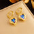 Fashion Heart Titanium Steel Diamond Inlay Earrings