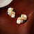 Mid-century Modern Flower Flower Alloy Oil Dripping Earrings