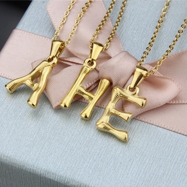 Platform New Stainless Steel Antique Slub-shaped 26 Letter Necklace Hot Gold English Titanium Steel Pendant Wholesale