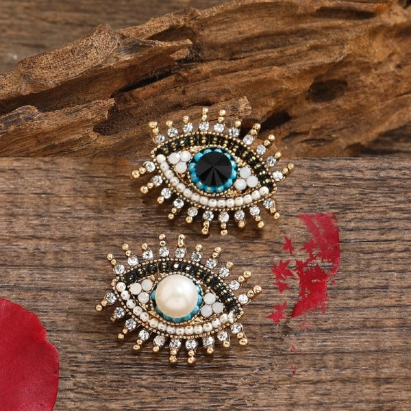 Retro Pin Devil'S Eye Alloy Inlay Rhinestones Pearl Unisex Brooches