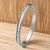 Retro Round Titanium Steel Inlay Zircon Bangle