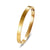 Retro Round Titanium Steel Inlay Zircon Bangle