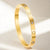 Retro Round Titanium Steel Inlay Zircon Bangle