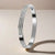 Retro Round Titanium Steel Inlay Zircon Bangle