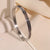 Retro Round Titanium Steel Inlay Zircon Bangle