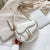 Texture Wide Shoulder Strap Messenger Handbag Wholesale