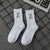 Unisex Casual Sports Letter Cotton Crew Socks A Pair