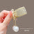 White Lotus Pearl High Ponytail Hairpin Female Back Of Head Small Grab Clip Half Tie Hair Fixing Artifact Step Tassel Grab Clip