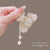 White Lotus Pearl High Ponytail Hairpin Female Back Of Head Small Grab Clip Half Tie Hair Fixing Artifact Step Tassel Grab Clip