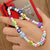 Wholesale Ethnic Style Color Soft  Letter Eyes Beaded Mobile Phone Chain