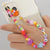 Wholesale Ethnic Style Color Soft  Letter Eyes Beaded Mobile Phone Chain