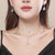 Wholesale Korean Copper Crystal Necklace Earring Two-piece Set