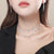 Wholesale Korean Copper Crystal Necklace Earring Two-piece Set