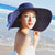 Women's Basic Solid Color Bowknot Flat Eaves Sun Hat