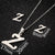 Women's Fashion Simple Style Letter Stainless Steel Pendant Necklace Ear Studs Plating Jewelry Sets