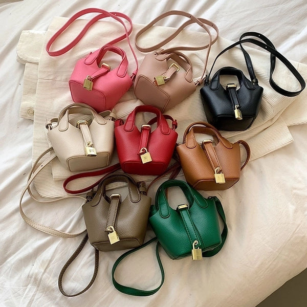 Women's Medium Pu Leather Solid Color Streetwear Bucket Lock Clasp Handbag Crossbody Bag