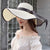 Women's Vacation Solid Color Bowknot Big Eaves Straw Hat