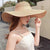 Women's Vacation Solid Color Bowknot Big Eaves Straw Hat